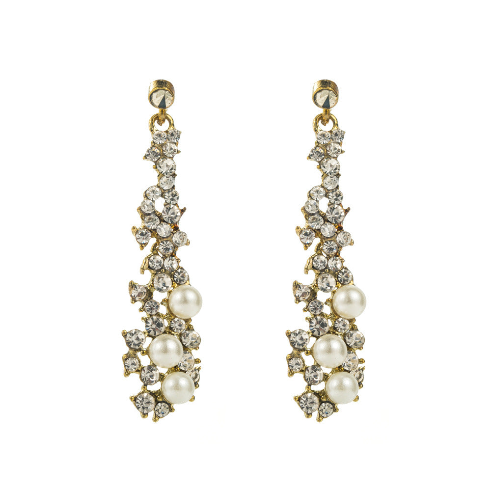 Wholesale Exaggerated Fashion Long Flower Simple Gold Temperament Earrings